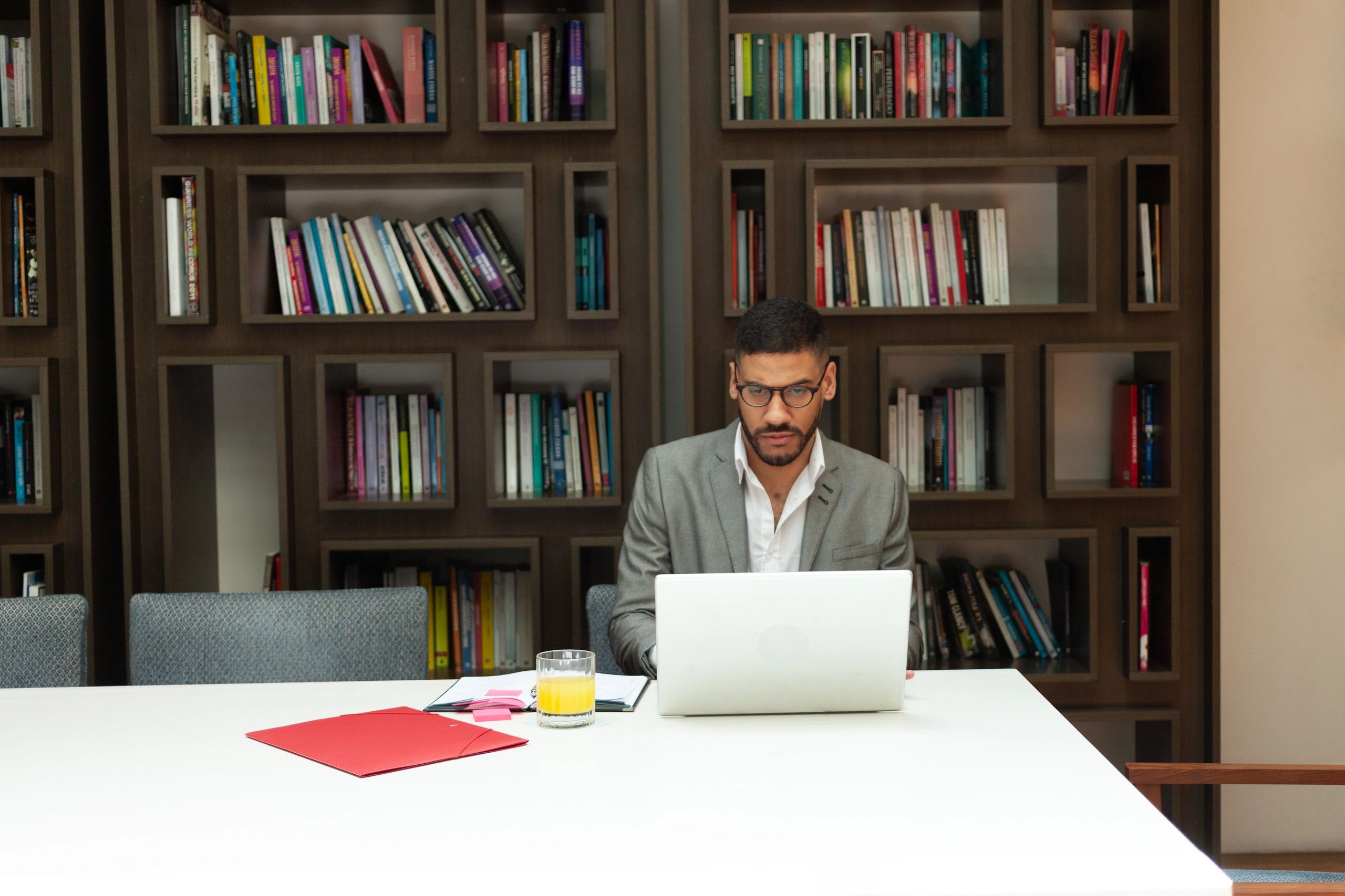 Entrepreneur working on a laptop during a strategy session