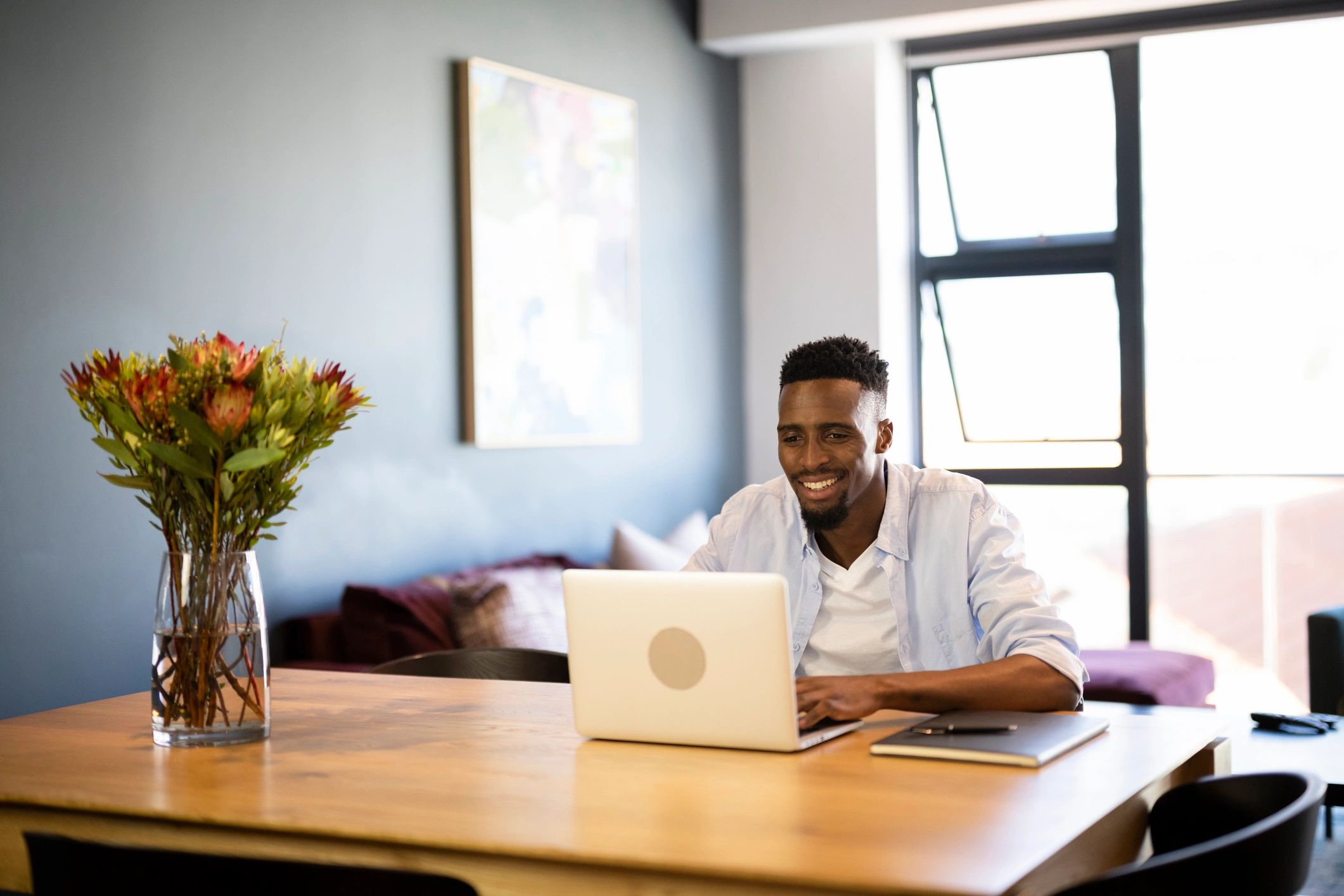 Professional consultant working on a laptop during a strategy session