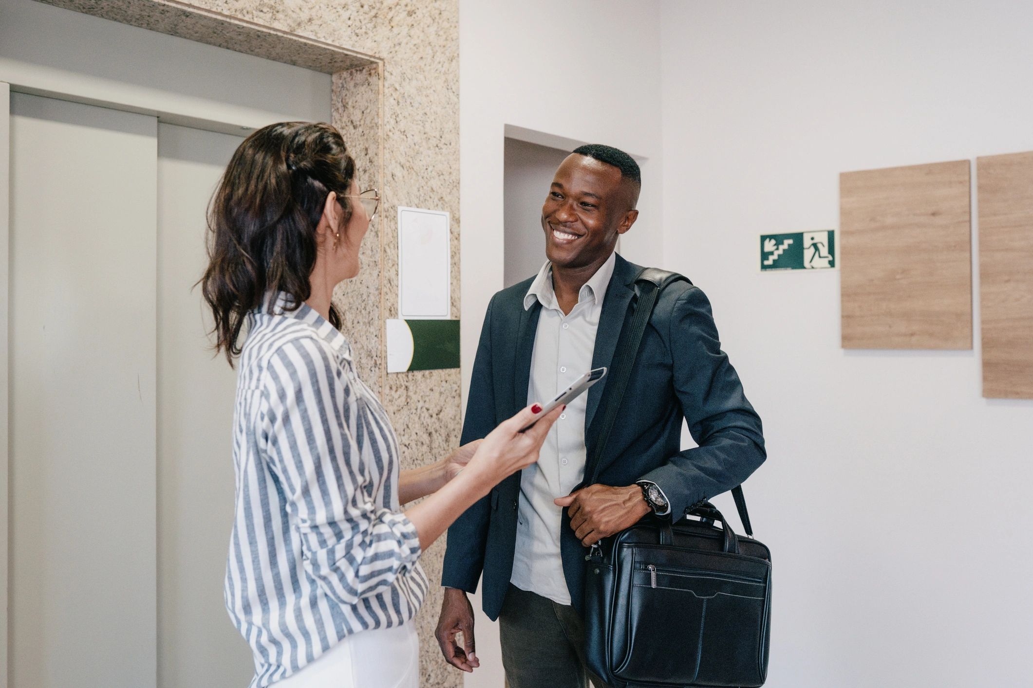 Consultant reviewing business information with client