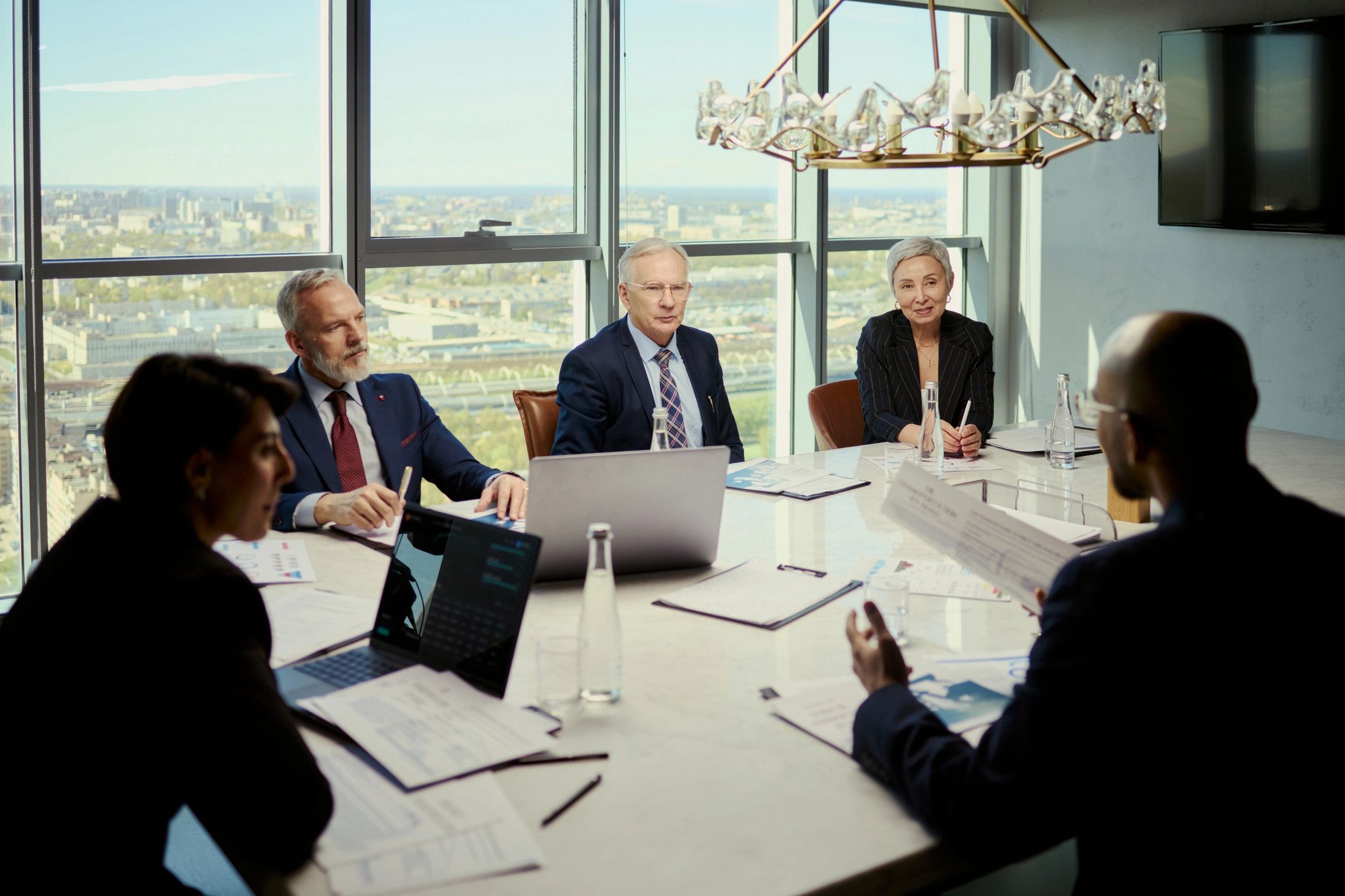 Business team reviewing strategy in a boardroom